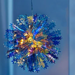 Dekofiguren|Die moderne Hausfrau LED-Schneeflocke